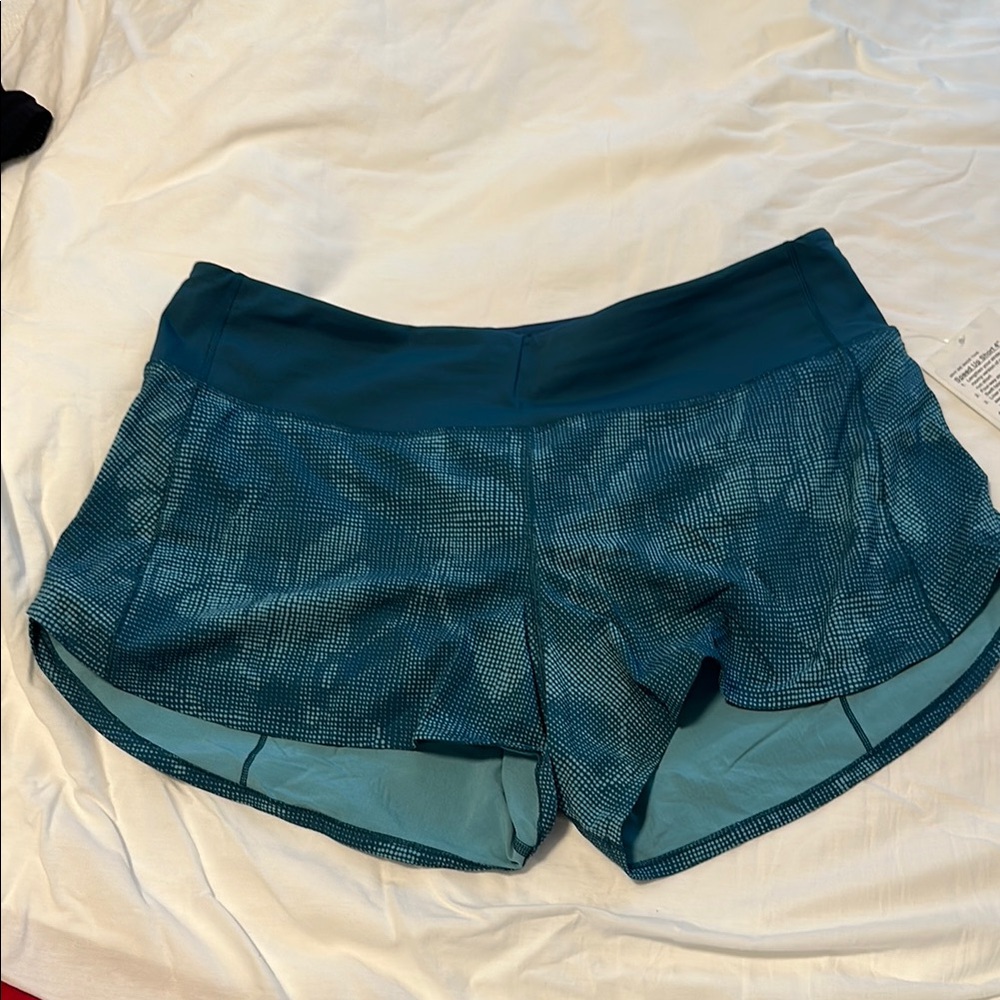 Lululemon Teal Athletic Shorts with Curved Hem and Elastic Waistband